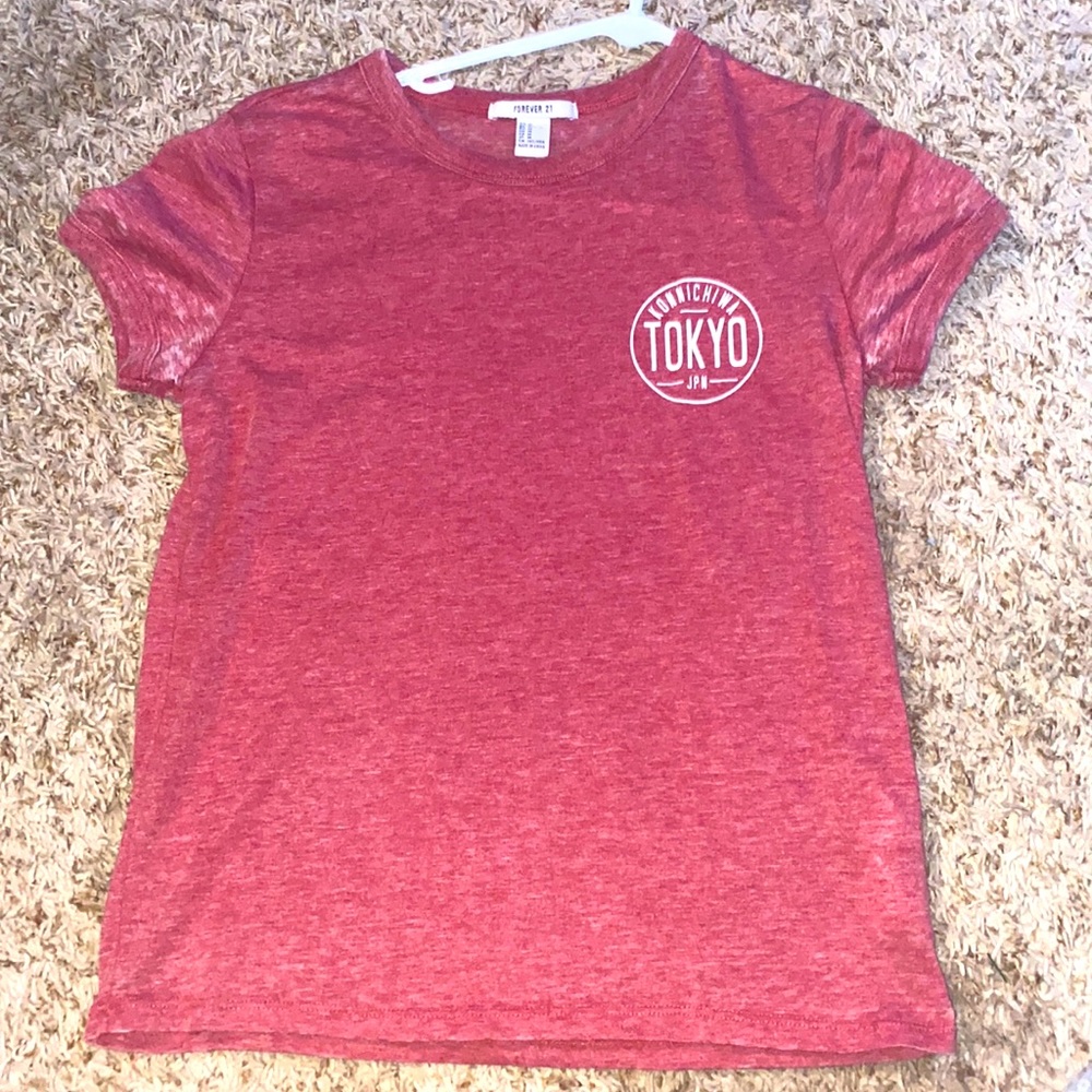 A red and white t shirt with a Tokyo japan logo,size medium from forever 21.
